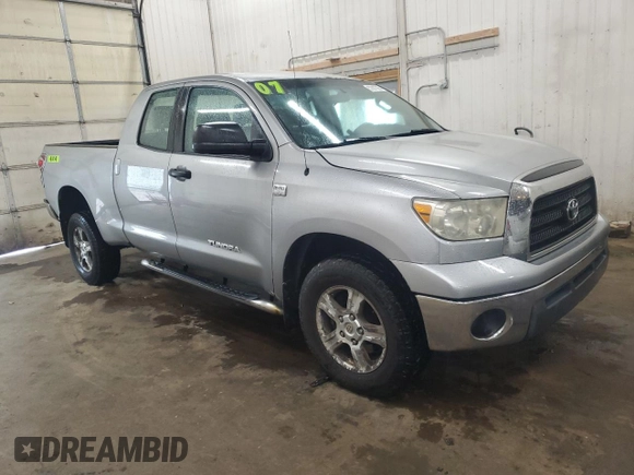 2007 Toyota Tundra SR5 with VIN 5TBBT54197S451993, listed as a Copart auction lot 57887565 with 284,398 mi miles and Salvage title. Bid and sale history available at DreamBid. Image 4.