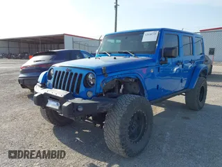 2016 Jeep Wrangler Unlimited 75th Anniversary with VIN 1C4BJWEG7GL179001, listed as a IAAI auction lot 42030735 with 123,681 mi miles. Bid and sale history available at carsss.com. Image 2.