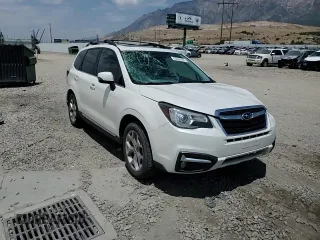 2018 Subaru Forester Touring with VIN JF2SJAWC4JH435749, listed as a Copart auction lot 63526465 with 143,029 mi miles and Salvage title. Bid and sale history available at DreamBid. Image 14.