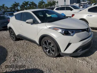 2019 Toyota C-HR XLE z VIN JTNKHMBX7K1014151, wystawiony jako Copart lot #50699475 z przebiegiem 102 995 mil mil oraz Czysty tytuł • Clean title. Historia ofert i sprzedaży dostępna na DreamBid. Obrazek 4.