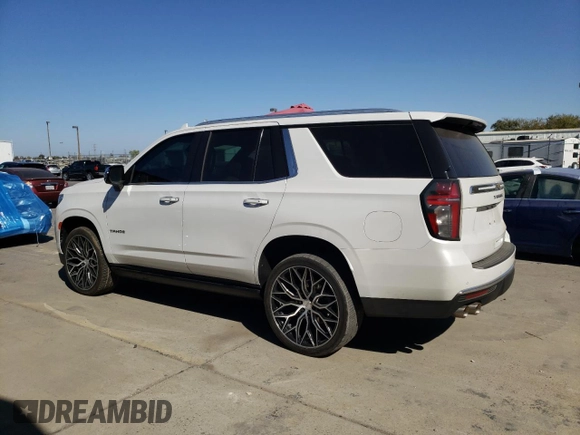 2023 Chevrolet Tahoe Premier with VIN 1GNSCSKD6PR119132, listed as a Copart auction lot 74594664 with 27,716 mi miles and Salvage title. Bid and sale history available at DreamBid. Image 2.