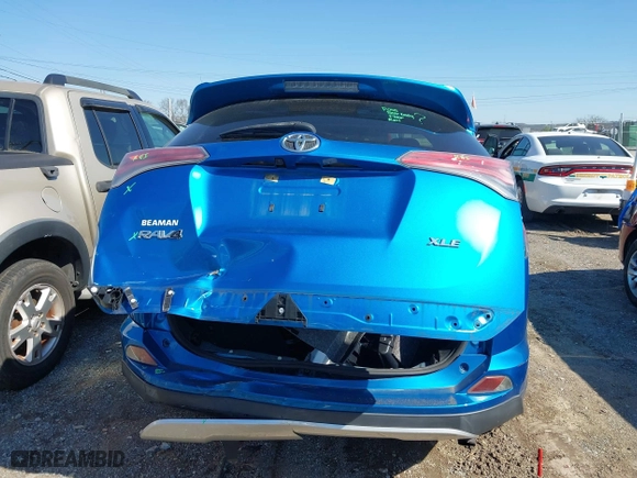 2016 Toyota RAV4 XLE with VIN JTMWFREV3GJ098415, listed as a IAAI auction lot 41866800 with 97,440 mi miles. Bid and sale history available at carsss.com. Image 16.