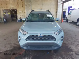2020 Toyota RAV4 Hybrid XLE with VIN 2T3RWRFV0LW082793, listed as a IAAI auction lot 41674569 with 50,224 mi miles and . Bid and sale history available at DreamBid. Image 12.