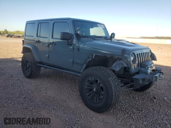 2014 Jeep Wrangler Unlimited Rubicon with VIN 1C4HJWFG9EL199501, listed as a Copart auction lot 61443595 with 86,940 mi miles and Salvage title. Bid and sale history available at DreamBid. Image 4.
