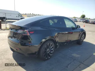 2023 Tesla Model Y Long Range z VIN 7SAYGAEE7PF859030, wystawiony jako Copart lot #58965185 z przebiegiem 18 421 mil mil oraz Czysty tytuł • Clean title. Historia ofert i sprzedaży dostępna na DreamBid. Obrazek 3.