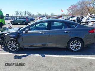 2017 Ford Fusion SE with VIN 3FA6P0H70HR107252, listed as a IAAI auction lot 42041332 with 121,255 mi miles. Bid and sale history available at carsss.com. Image 14.