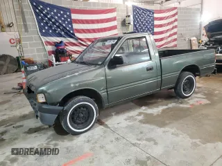 1995 Isuzu Pickup S z VIN JAACL11L0S7211543, wystawiony jako Copart lot #81881194 z przebiegiem 215 222 mil mil oraz Szkody całkowita. Historia ofert i sprzedaży dostępna na DreamBid. Obrazek 1.