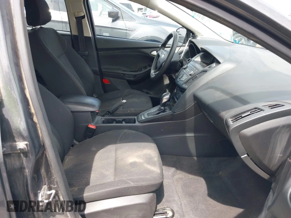 2018 Ford Focus SE with VIN 1FADP3F20JL312395, listed as a IAAI auction lot 42110335 with 110,720 mi miles and . Bid and sale history available at DreamBid. Image 5.