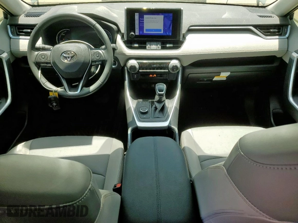 2023 Toyota RAV4 Hybrid XLE Premium with VIN JTMB6RFV4PD116089, listed as a Copart auction lot 61087995 with 18,837 mi miles and Clean title. Bid and sale history available at DreamBid. Image 8.