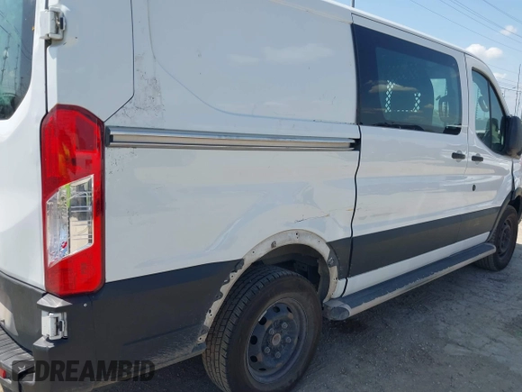 2019 Ford Transit with VIN 1FTYR1YM2KKB01764, listed as a IAAI auction lot 42216591 with 193,653 mi miles and . Bid and sale history available at DreamBid. Image 6.
