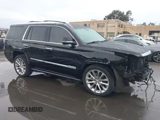 2017 Cadillac Escalade Premium Luxury z VIN 1GYS4CKJ4HR401699, wystawiony jako IAAI lot #41094629 z przebiegiem 104 510 mil mil oraz . Historia ofert i sprzedaży dostępna na DreamBid. Obrazek 1.