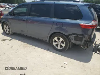 2015 Toyota Sienna LE AAS with VIN 5TDKK3DC2FS651385, listed as a Copart auction lot 62451275 with 166,610 mi miles and Salvage title. Bid and sale history available at DreamBid. Image 2.