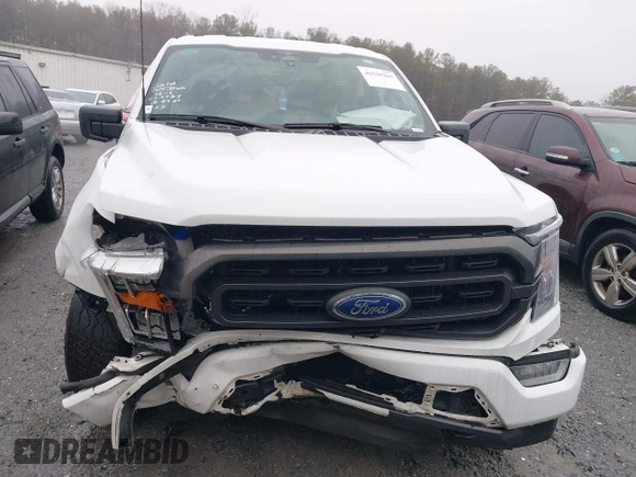 2023 Ford F-150 XL with VIN 1FTFW1E56PFA90555, listed as a IAAI auction lot 41539367 with 53,905 mi miles. Bid and sale history available at carsss.com. Image 6.