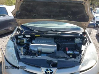 2007 Toyota Sienna CE with VIN 5TDZK23C57S061242, listed as a IAAI auction lot 41738859 with Not Provided miles and . Bid and sale history available at DreamBid. Image 10.