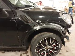 2012 MINI Countryman with VIN WMWZB3C53CWM05133, listed as a IAAI auction lot 41493309 with 114,412 mi miles and . Bid and sale history available at DreamBid. Image 20.