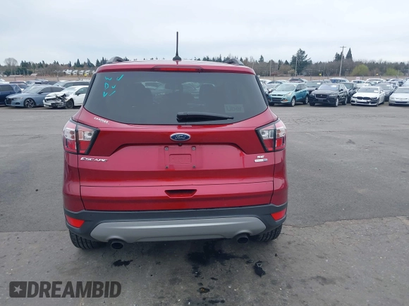 2018 Ford Escape SE z VIN 1FMCU9GD8JUB14803, wystawiony jako IAAI lot #41842056 z przebiegiem 50 712 mil mil oraz . Historia ofert i sprzedaży dostępna na DreamBid. Obrazek 17.
