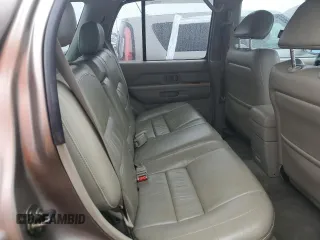 2001 Infiniti QX4 Luxury z VIN JNRDR07X81W103465, wystawiony jako Copart lot #73761114 z przebiegiem 160 676 mil mil oraz Szkody całkowita. Historia ofert i sprzedaży dostępna na DreamBid. Obrazek 11.