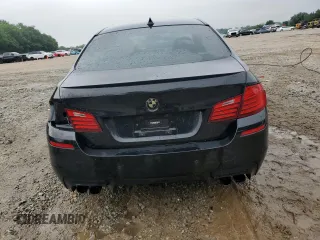 2014 BMW M5 z VIN WBSFV9C58ED097285, wystawiony jako Copart lot #55835345 z przebiegiem 108 189 mil mil oraz Szkody całkowita. Historia ofert i sprzedaży dostępna na DreamBid. Obrazek 6.