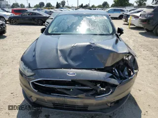 2017 Ford Fusion Hybrid SE with VIN 3FA6P0LU0HR355272, listed as a Copart auction lot 62834325 with 147,572 mi miles and Clean title. Bid and sale history available at DreamBid. Image 5.