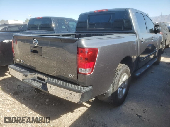 2014 Nissan Titan SV with VIN 1N6AA0ED2EN513724, listed as a Copart auction lot 58641975 with 221,961 mi miles and Salvage title. Bid and sale history available at DreamBid. Image 3.