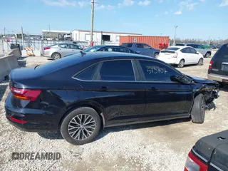 2019 Volkswagen Jetta SEL z VIN 3VWE57BU9KM064213, wystawiony jako IAAI lot #41916005 z przebiegiem 50 719 mil mil oraz . Historia ofert i sprzedaży dostępna na DreamBid. Obrazek 13.