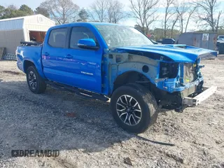 2020 Toyota Tacoma SR5 z VIN 3TMAZ5CN5LM138567, wystawiony jako IAAI lot #41741106 z przebiegiem 76 026 mil mil oraz . Historia ofert i sprzedaży dostępna na DreamBid. Obrazek 1.