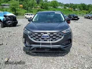 2020 Ford Edge SE z VIN 2FMPK4G94LBA36373, wystawiony jako Copart lot #60404825 z przebiegiem 73 149 mil mil oraz Szkoda całkowita • Salvage title. Historia ofert i sprzedaży dostępna na DreamBid. Obrazek 15.