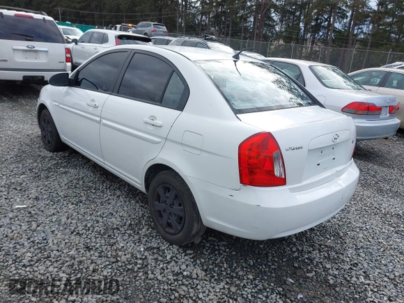 2006 Hyundai Accent GLS with VIN KMHCN46C36U009036, listed as a IAAI auction lot 41705369 with 134,328 mi miles. Bid and sale history available at carsss.com. Image 3.