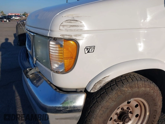 2002 Ford Econoline Cargo z VIN 1FDSE34L72HB41096, wystawiony jako IAAI lot #37394945 z przebiegiem 241 707 mil mil oraz . Historia ofert i sprzedaży dostępna na DreamBid. Obrazek 6.