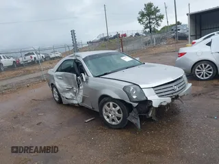 2005 Cadillac CTS z VIN 1G6DP567250120620, wystawiony jako IAAI lot #42076531 z przebiegiem Nie podano mil oraz . Historia ofert i sprzedaży dostępna na DreamBid. Obrazek 1.