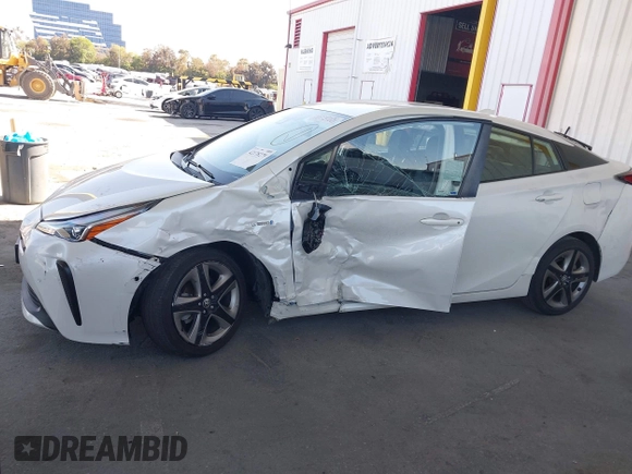 2020 Toyota Prius L Eco z VIN JTDKARFU4L3116504, wystawiony jako IAAI lot #42178279 z przebiegiem 33 668 mil mil oraz . Historia ofert i sprzedaży dostępna na DreamBid. Obrazek 6.