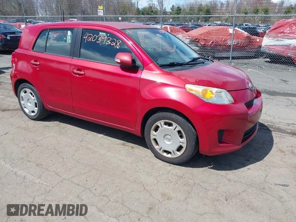 2008 Scion xD with VIN JTKKU104X8J027713, listed as a IAAI auction lot 42039328 with 217,720 mi miles. Bid and sale history available at carsss.com. Image 1.