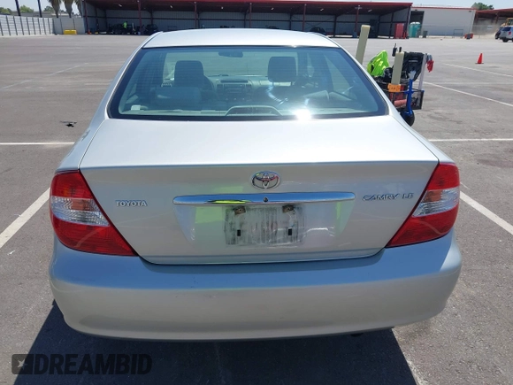 2004 Toyota Camry LE with VIN 4T1BE32K74U300025, listed as a IAAI auction lot 42035954 with 115,203 mi miles. Bid and sale history available at carsss.com. Image 16.