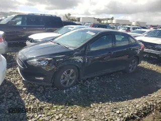 2018 Ford Focus SE with VIN 1FADP3F21JL288026, listed as a Copart auction lot 46908205 with 70,739 mi miles and Salvage Title. Bid and sale history available at carsss.com. Image 1.