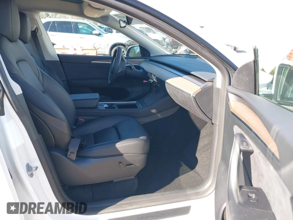 2023 Tesla Model Y Long Range with VIN 7SAYGAEE1PF828338, listed as a IAAI auction lot 40978725 with Not Provided miles and . Bid and sale history available at DreamBid. Image 5.