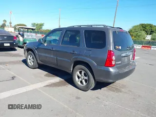 2006 Mazda Tribute S with VIN 4F2CZ04196KM12520, listed as a IAAI auction lot 41872221 with Not Provided miles and . Bid and sale history available at carsss.com. Image 3.