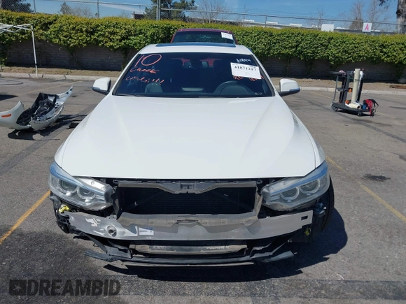 2017 BMW 4 Series 430i with VIN WBA4F7C31HG789340, listed as a IAAI auction lot 41871217 with 97,971 mi miles and . Bid and sale history available at DreamBid. Image 12.