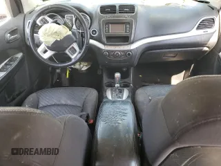 2013 Dodge Journey SE с VIN 3C4PDCAB9DT656887, выставлен на аукционе Copart как лот 54791315 с пробегом 130 394 миль миль и Списание • Salvage title. История ставок и продаж доступна на DreamBid. Изображение 8.