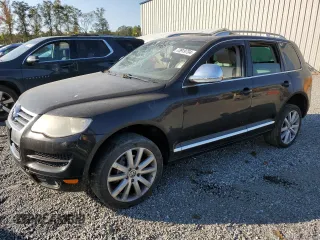 2010 Volkswagen Touareg VR6 with VIN WVGBF7A92AD002237, listed as a Copart auction lot 73919754 with 124,072 mi miles and Salvage Title. Bid and sale history available at DreamBid. Image 1.