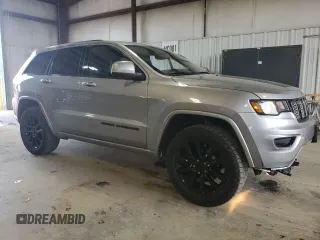 2017 Jeep Grand Cherokee Altitude with VIN 1C4RJFAG9HC772705, listed as a Copart auction lot 61562925 with 184,004 mi miles and Salvage title. Bid and sale history available at DreamBid. Image 4.
