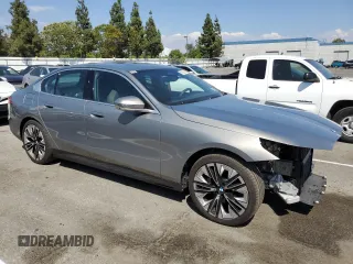 2024 BMW 5 Series 530i with VIN WBA43FJ06RCR20072, listed as a Copart auction lot 69864814 with 4,871 mi miles and Salvage Title. Bid and sale history available at carsss.com. Image 4.