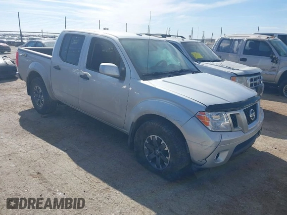 2018 Nissan Frontier SV with VIN 1N6AD0EV0JN761092, listed as a IAAI auction lot 41502701 with 103,900 mi miles and . Bid and sale history available at DreamBid. Image 1.