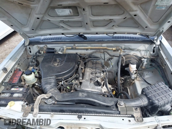 2000 Nissan Frontier XE z VIN 1N6DD26S9YC305451, wystawiony jako IAAI lot #41928123 z przebiegiem Nie podano mil oraz . Historia ofert i sprzedaży dostępna na DreamBid. Obrazek 10.