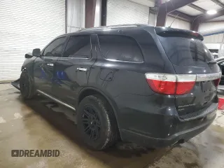 2013 Dodge Durango Crew with VIN 1C4SDJDT8DC509541, listed as a Copart auction lot 54063395 with 145,471 mi miles and Salvage title. Bid and sale history available at DreamBid. Image 2.