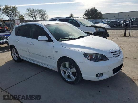 2006 Mazda 3 S Sport with VIN JM1BK144861463027, listed as a Copart auction lot 49772215 with 263,297 mi miles and Salvage Title. Bid and sale history available at DreamBid. Image 4.