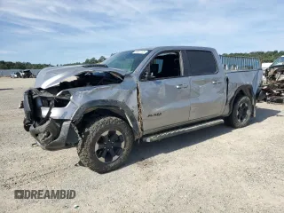 2020 Ram 1500 Rebel with VIN 1C6SRFLT0LN215917, listed as a Copart auction lot 58087705 with 69,683 mi miles and Salvage title. Bid and sale history available at DreamBid. Image 1.