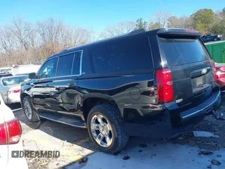 2015 Chevrolet Suburban LTZ with VIN 1GNSCKKC3FR249956, listed as a IAAI auction lot 41306605 with 122,942 mi miles and . Bid and sale history available at DreamBid. Image 14.
