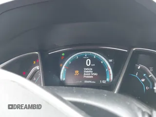 2018 Honda Civic EX with VIN 2HGFC2F71JH502564, listed as a IAAI auction lot 41933157 with 56,696 mi miles and . Bid and sale history available at DreamBid. Image 7.