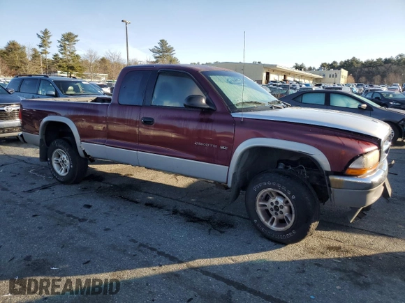 2000 Dodge Dakota SLT with VIN 1B7GG22X7YS639007, listed as a Copart auction lot 84829204 with 148,408 mi miles and Salvage Title. Bid and sale history available at DreamBid. Image 4.