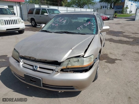 2002 Honda Accord Sdn SE with VIN 1HGCG66812A155003, listed as a IAAI auction lot 41934724 with 192,129 mi miles. Bid and sale history available at carsss.com. Image 6.